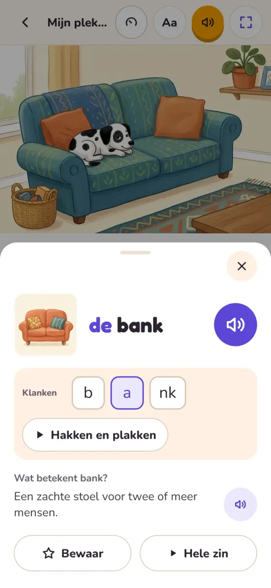 Het woord bank is aangetikt: een plaatje van een bank, de klanken b, a en nk, de knop Hakken en plakken, en de uitleg: een zachte stoel voor twee of meer mensen.